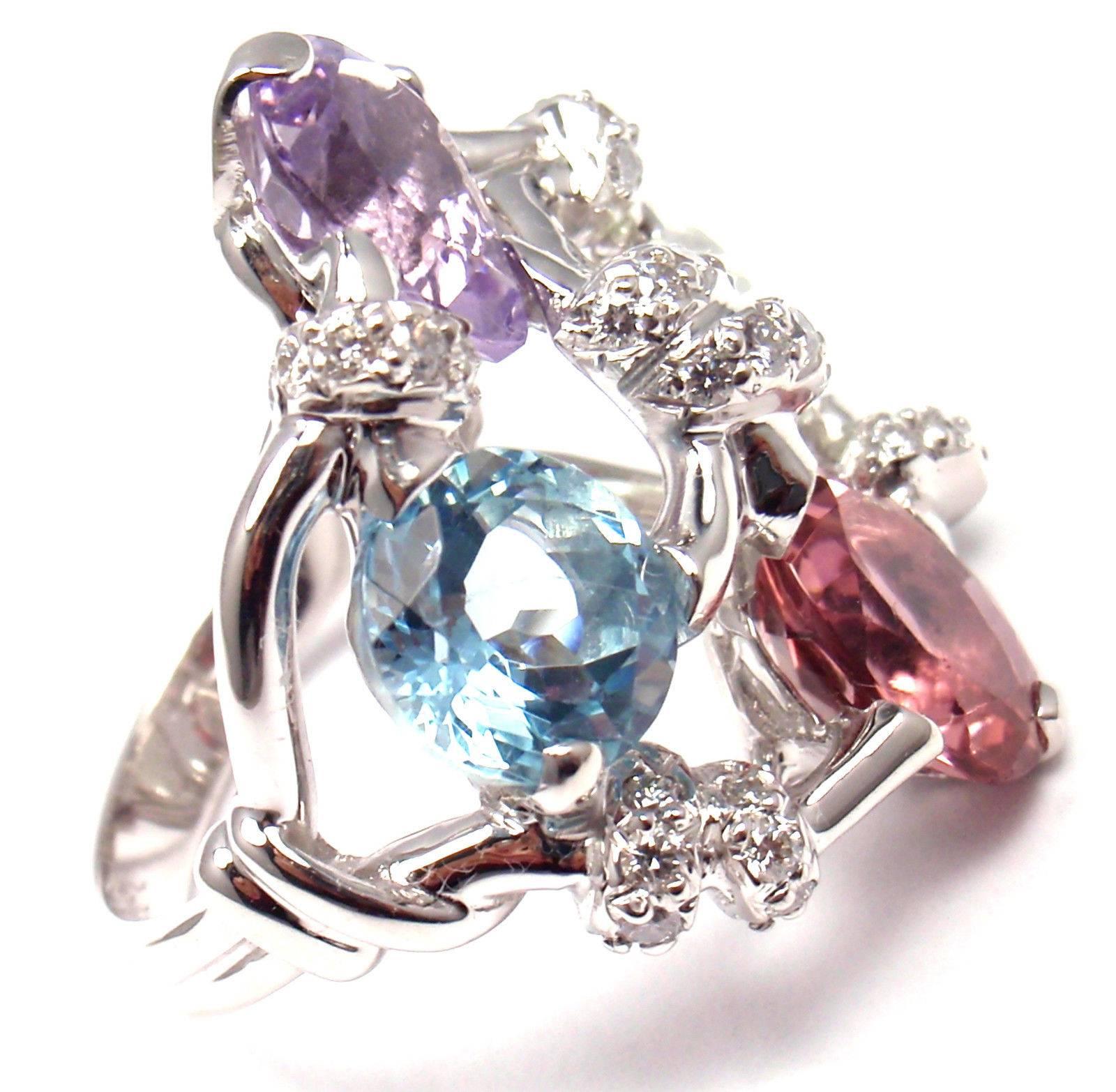18k White Gold Venitienne Diamond Tourmaline Beryl Aquamarine Amethyst Ring by Chanel. 
With 28 brilliant cut diamonds F color VVS1 clarity
total weight approx. .60ct
1 pear shape pink tourmaline 2.20ct
1 pear shape green beryl 1.70ct
1 round blue