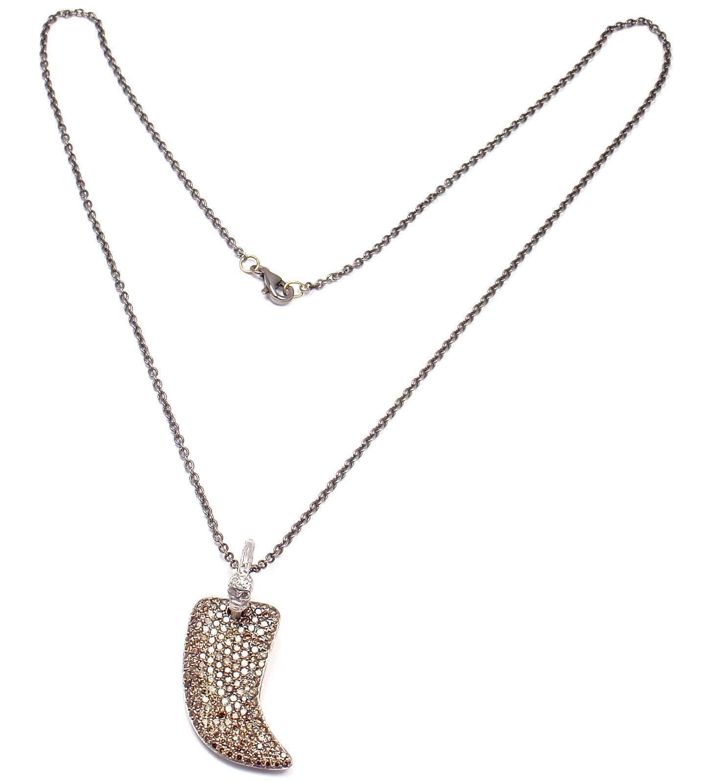 18k White Gold Color Diamond Large Claw Pendant Necklace by Loree Rodkin. 
With Colored round diamonds total weight approx. 1.85ct
This This necklace used to belong to Jackie Collins and was 
purchased from her jewelry estate collection.

Details: