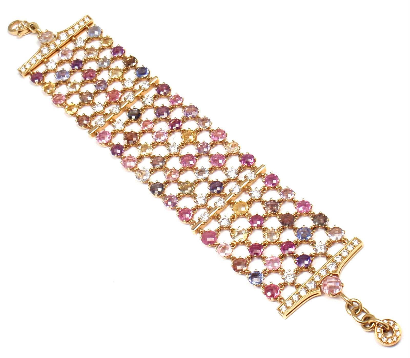 18k Yellow Gold Diamond And Fancy Color Sapphires Link Bracelet by Bulgari.  
With 74 Fancy Color Sapphires total weight approx. 36.65ct
13 round brilliant cut diamonds color F-G clarity VS1 total weight approx. 3.30ct
8 round brilliant cut diamonds