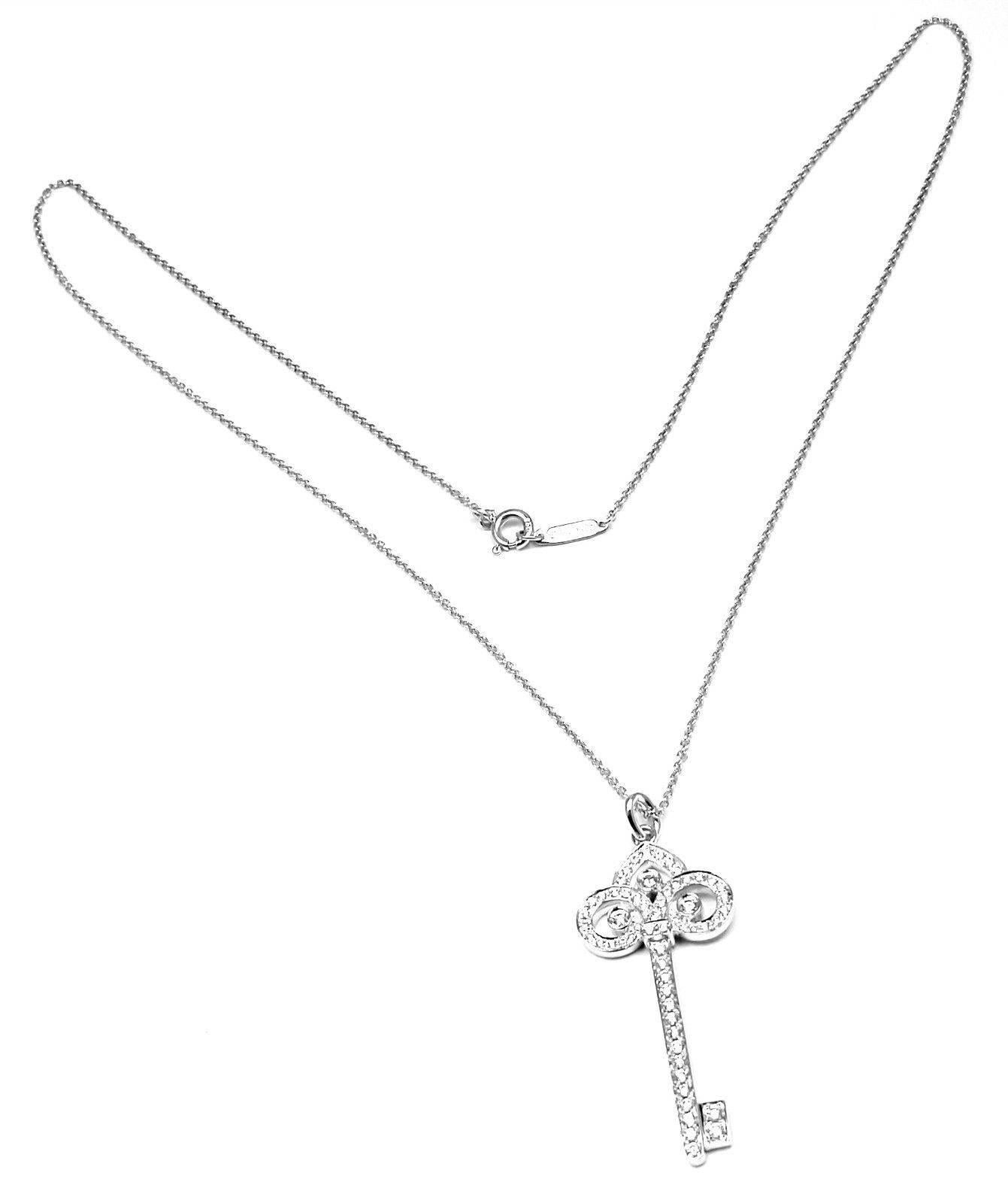Tiffany & Co. Fleur-de-Lis Key Diamond White Gold Pendant Necklace In New Condition In Holland, PA