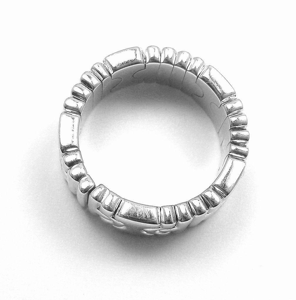 More About the Piece:

Metal: 18k white gold
Ring Size: 6
Width: 8mm
Weight 14 grams
Stones: None
Hallmarks: Bvlgari 750 Italy

*Free Shipping within the United States*

YOUR PRICE: $1,700

S046lad