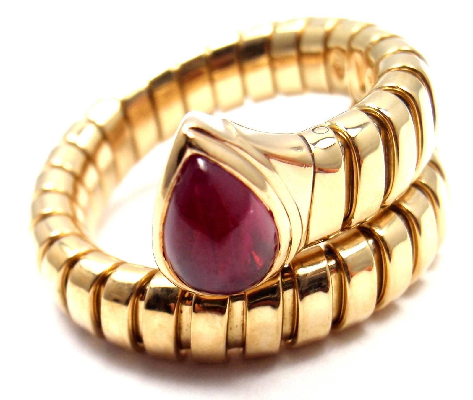 18k Yellow Gold Ruby Coil Snake Ring by Bulgari. 
With 1 pear shape ruby total weight approx. .50ct

Details:
Ring Size: 6-7 (the ring stretches)
Width: 13mm
Weight: 9.4 grams
Stamped Hallmarks:  Bulgari, 750

*Free Shipping within the United