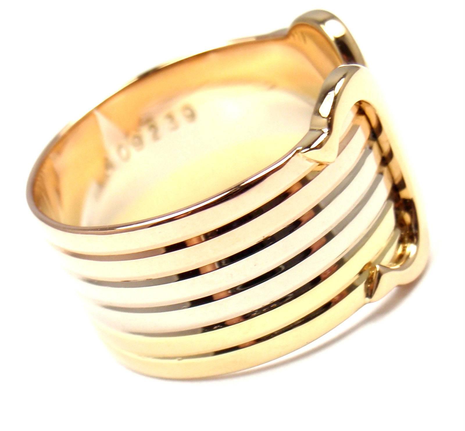 18k Tri-Color Gold Double C Motif Logo Band Ring by Cartier.
This ring comes with Cartier box.
Details:
Size:  European 55 US 7 1/4
Weight: 6.2 grams
Width: 13mm
Stamped Hallmarks: Cartier 750 55 409239

*Free Shipping within the United