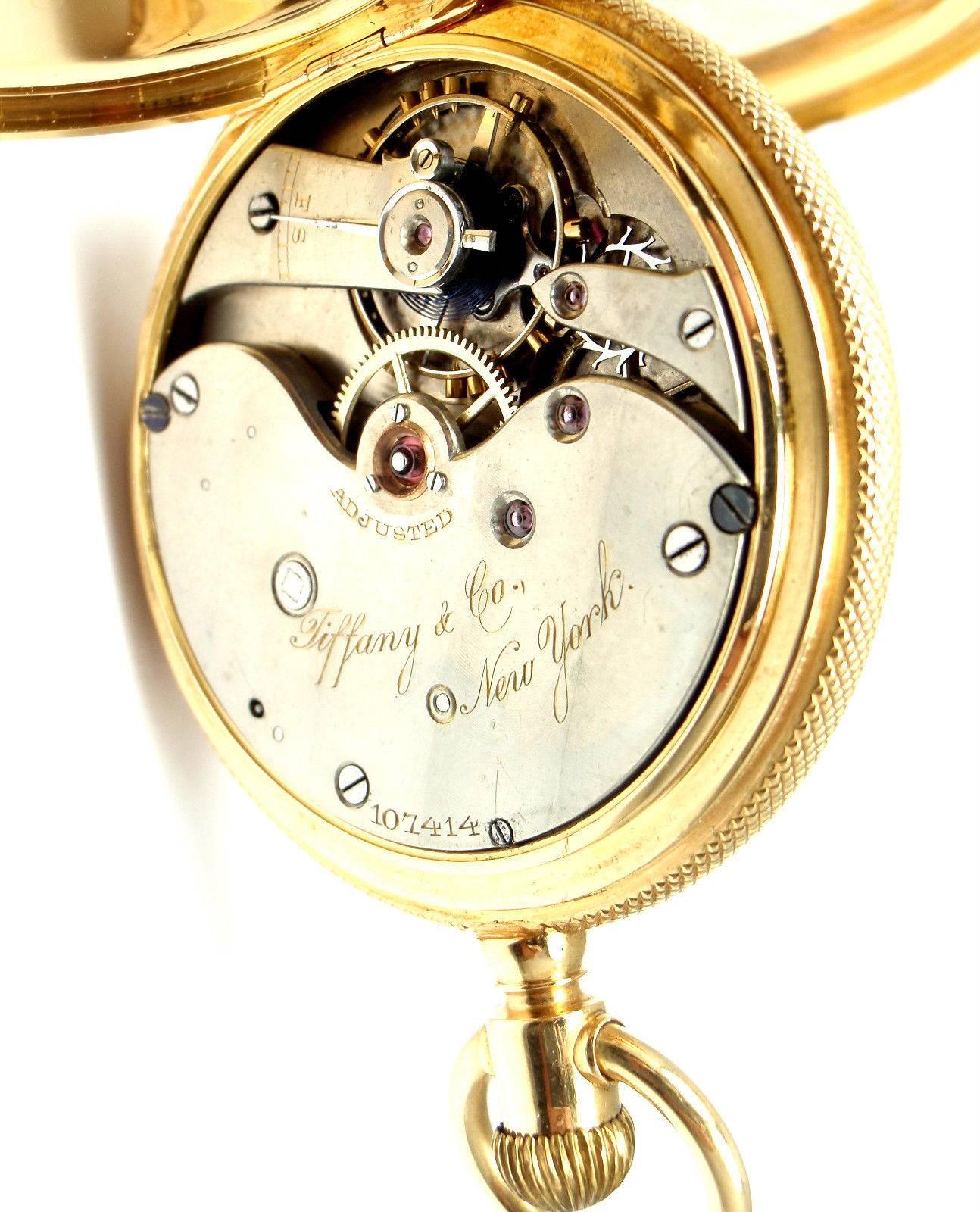 18k Yellow Gold Full Hunter Case Pocket Watch by Tiffany & Co. 
This watch has a solid 18k yellow gold case.
Works great, fully functional, triple signed.
Details: 
Case Size: 51mm
Weight: 113.8 grams
Movement: Mechanical Hand Winding
Stamped