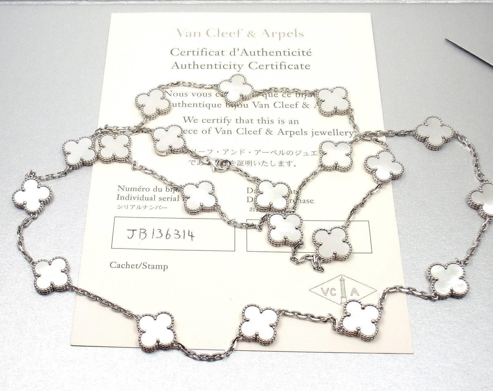 18k White Gold Alhambra 20 Motifs Mother Of Pearl Necklace by Van Cleef & Arpels. 
With 20 motifs of mother of pearl Alhambra stones 15mm each 
This necklace comes with Van Cleef & Arpels certificate. 
Details: 
Length: 33