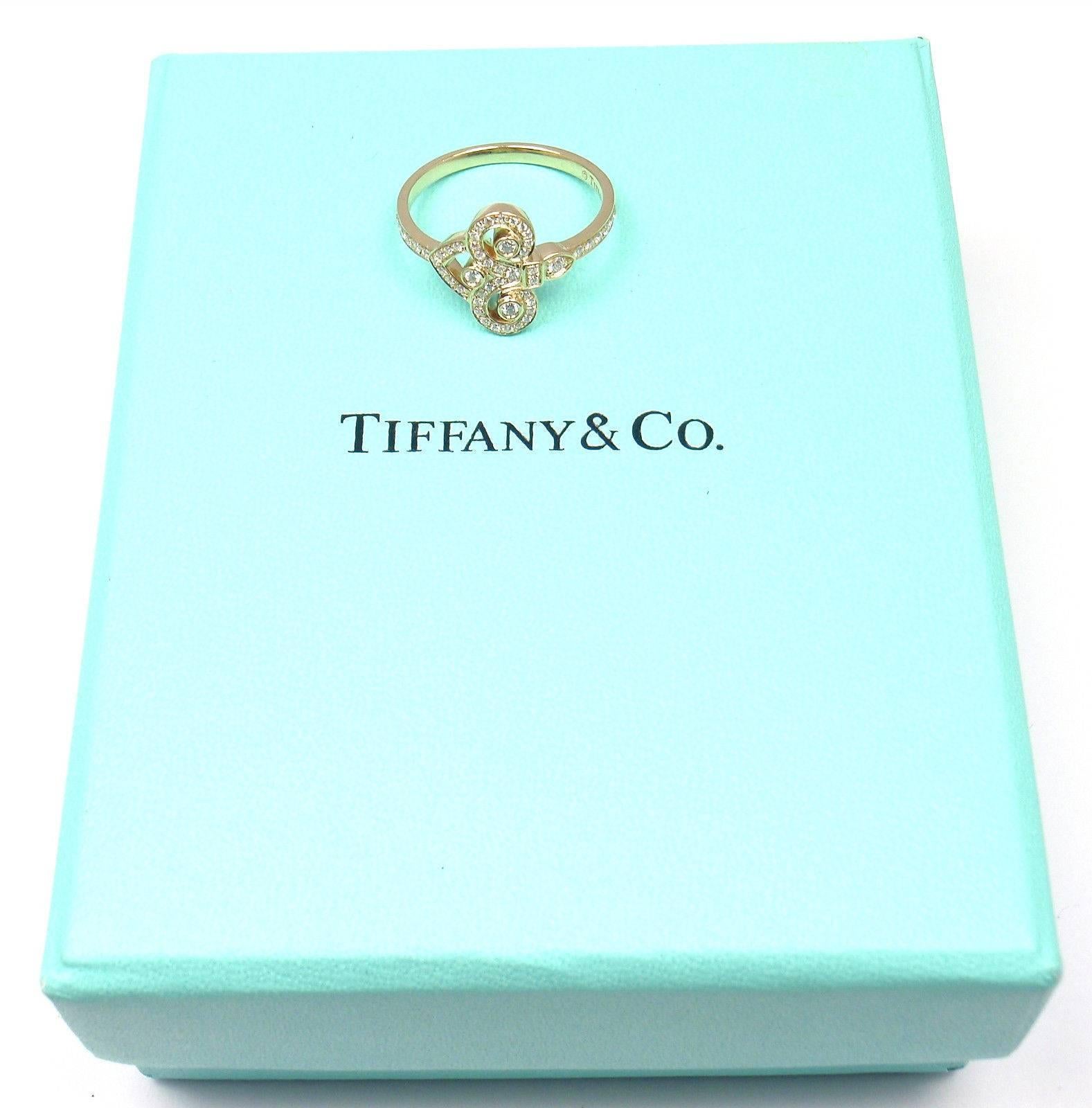 Tiffany & Co. Fleur-de-Lis Key Diamond Yellow Gold Band Ring In New Condition In Holland, PA