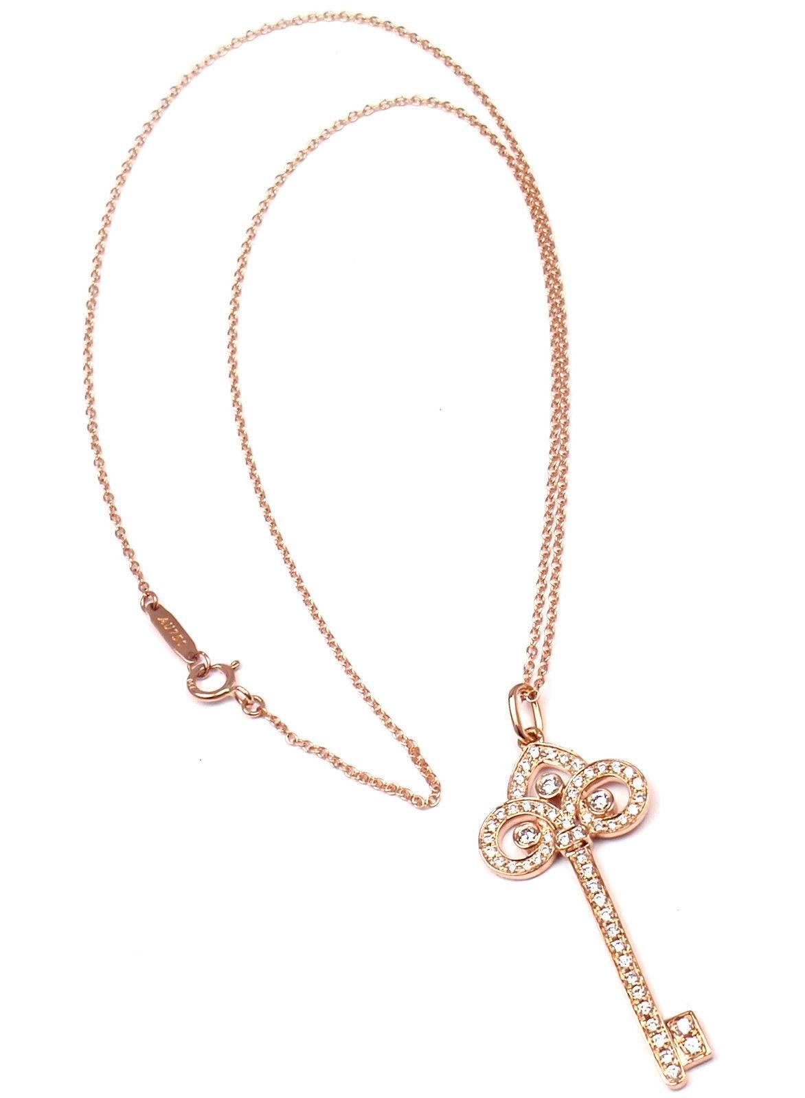 18k Rose Gold Diamond Fleur De Lis Diamond Key Pendant by Tiffany & Co.
With Round brilliant cut diamonds VS1 clarity, G color total weight approx. .40ct

Measurements:
Length: 16