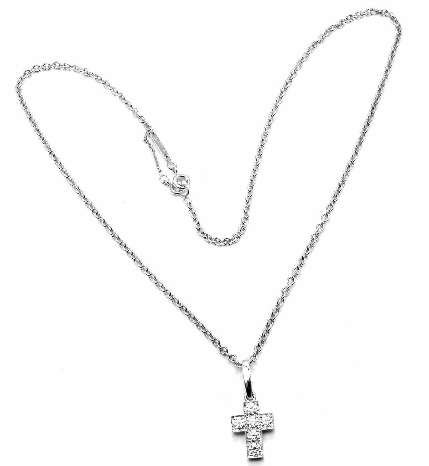 18k White Gold Diamond Cross Pendant Necklace by Cartier. 
With 6 round brilliant cut diamonds VVS1 clarity, E color total weight approx. .95ctw
This necklace comes with service paper from Cartier store in Japan.

Details: 
Length: 16.5