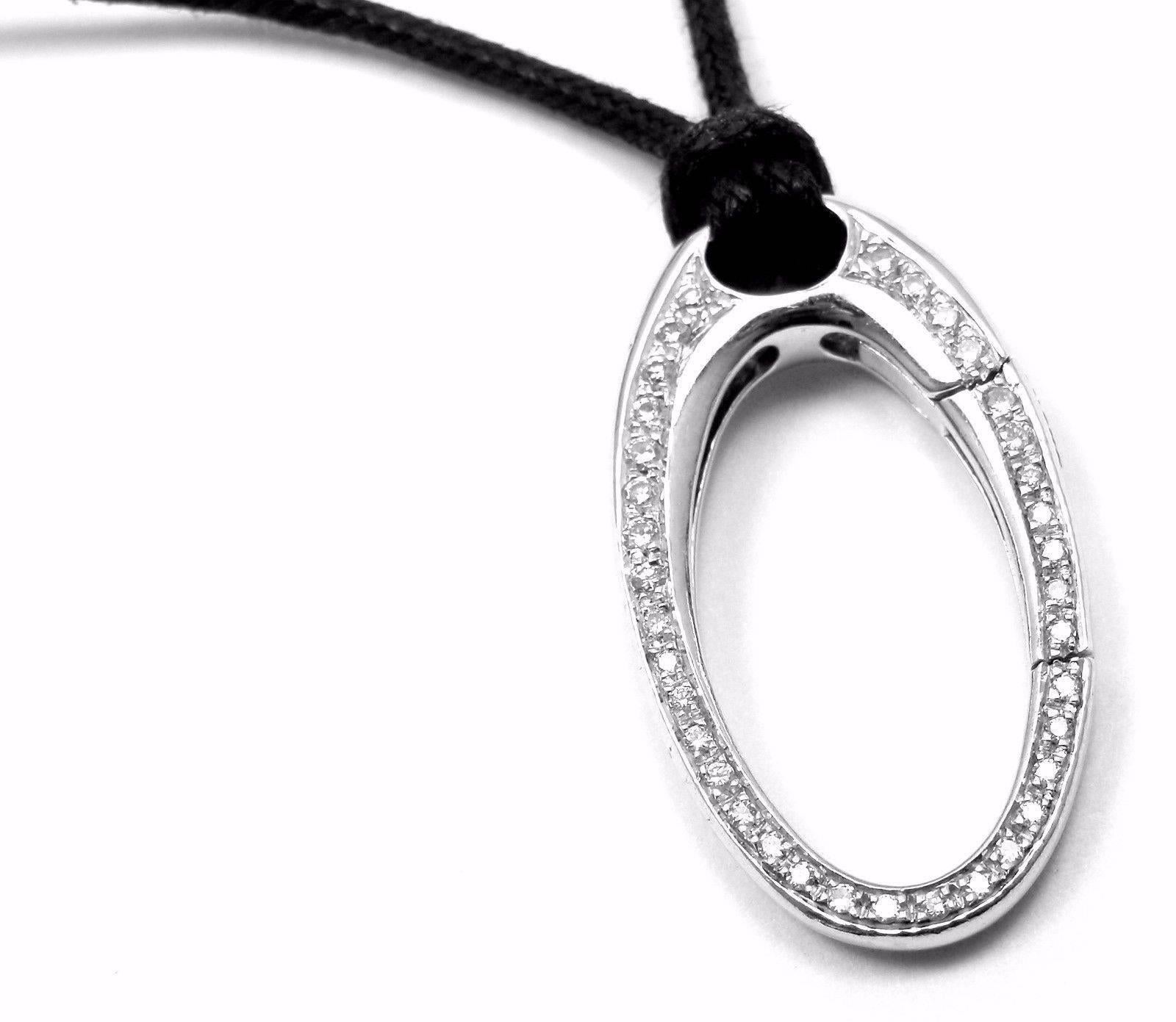 18k White Gold Diamond Oval Pendant Enhancer on A Silk Cord by Aaron Basha. 
With D36 round brilliant cut diamonds VS1 clarity, G color total weight approx. .70ct
Retail Price: $8,800
Details: 
Silk Cord 22