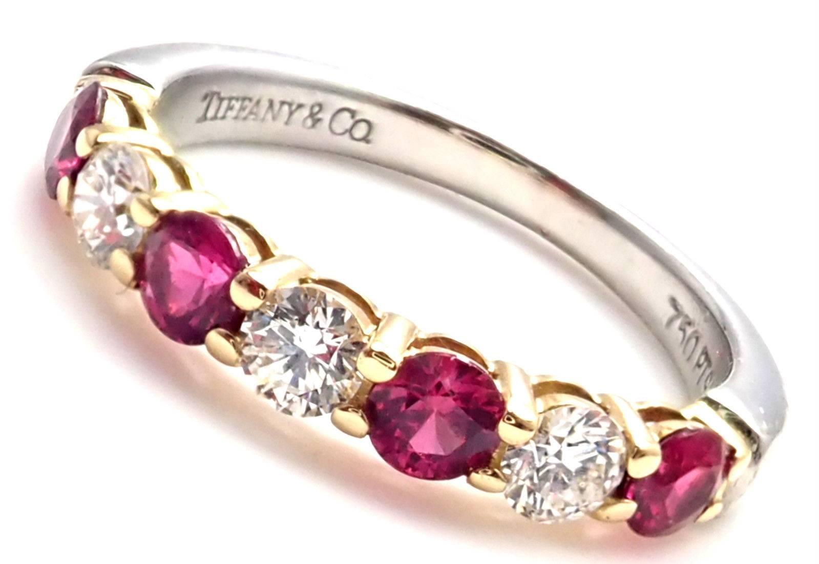 Platinum & Yellow Gold Diamond Ruby Band Ring by Tiffany & Co. 
With 3x Round brilliant cut diamonds VS1 clarity, G color total weight approx. .25ct
4x Round rubies .35ct
Details: 
Weight: 3.1 grams
Ring Size: 3.5 - Resize Available
Band width at