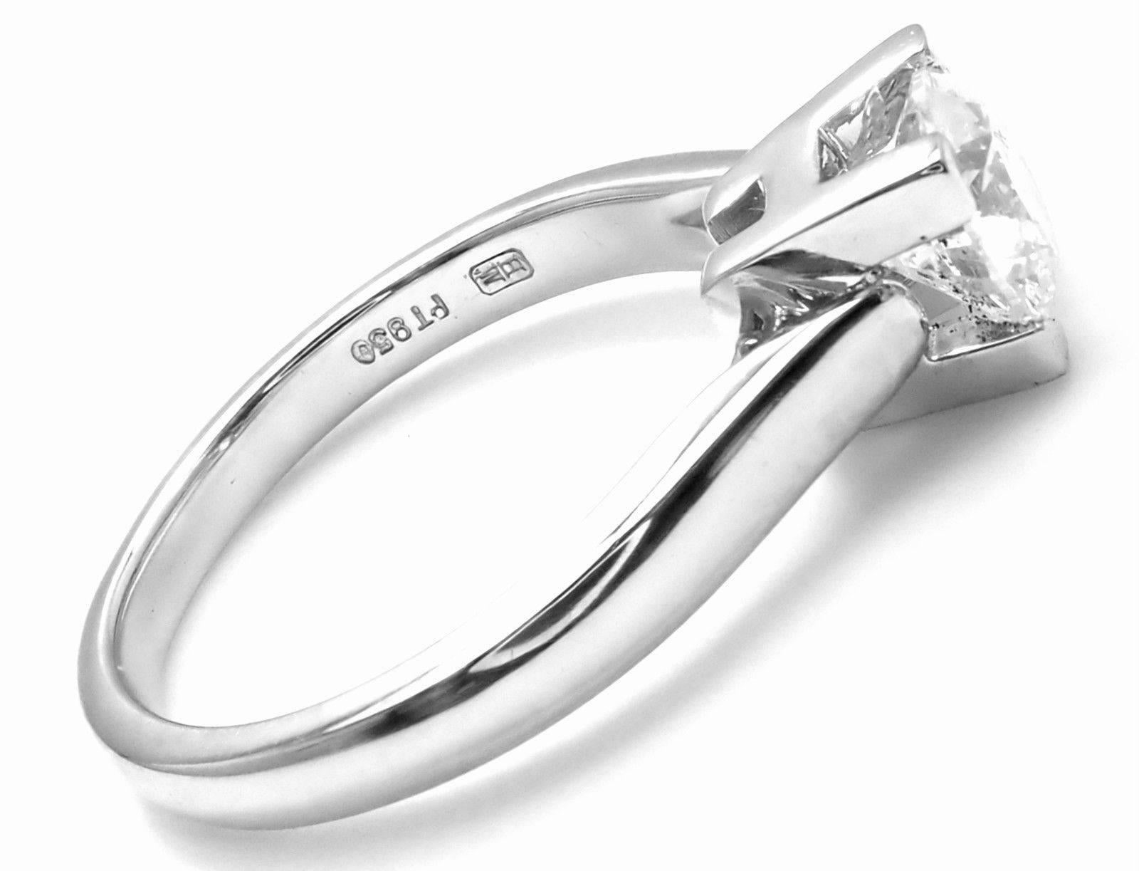 Platinum .71ct Diamond Solitaire Engagement Ring by Harry Winston. 
With 1 round brilliant cut diamonds VVS2 clarity, F color total weight approx. .71ct
Cut Excellent
Polish Very Good
Symmetry Very Good
Fluorescence None
This ring comes with GIA