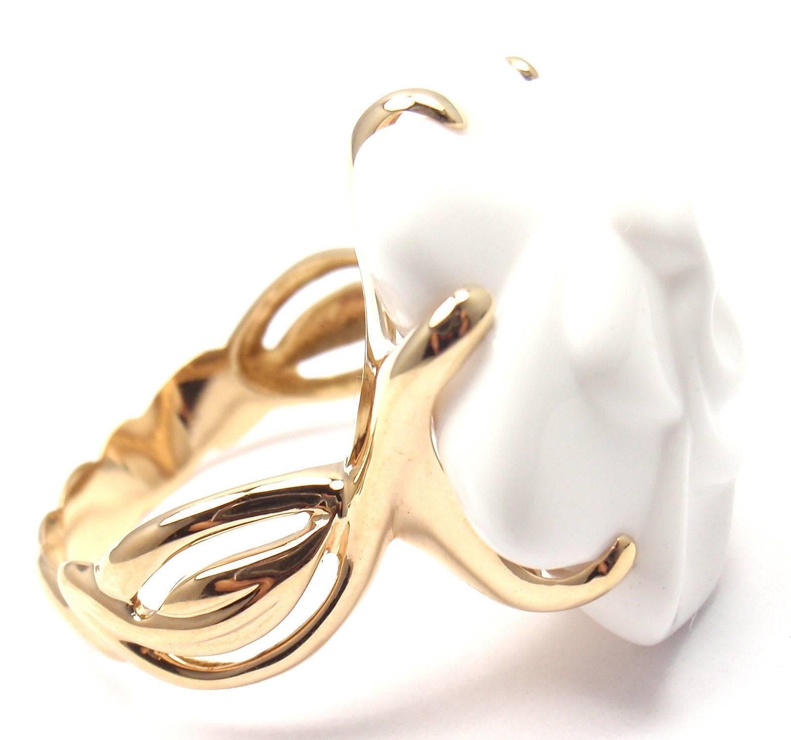 18k Yellow Gold Camelia Medium Size White Agate Flower Ring by Chanel. 
From Chanel's beautiful Camelia collection.
With 1 white agate stone 27mm x 27mm
Details: 
Ring Size: European 62, US 10 (resizing is available)
Measurements: 27mm
Weight: 15.2