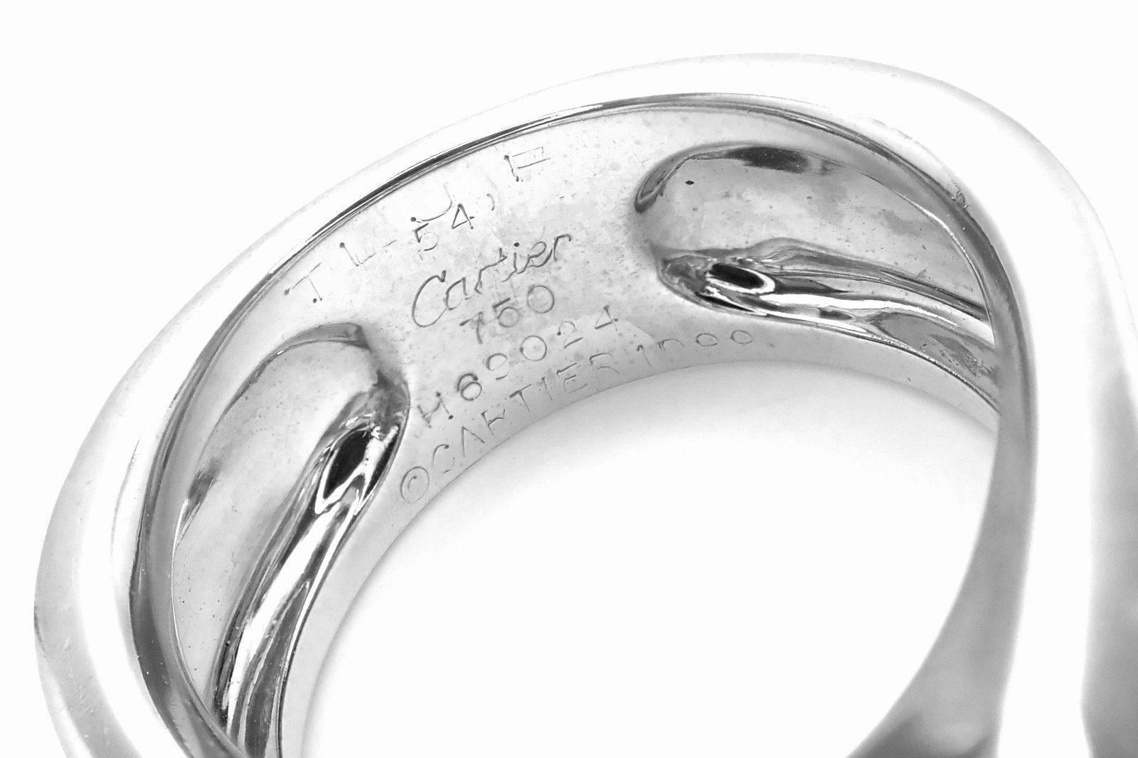 18k White Gold Large Chalcedony Ring by Cartier. 
With 1 oval chalcedony 14 x 5 mm.
Details: 
Ring Size: 7 US or 54 (European)
Weight: 18.6 grams
Stamped Hallmarks: Cartier 750 54 H69024 Cartier 1999
*Free Shipping within the United States* 
YOUR