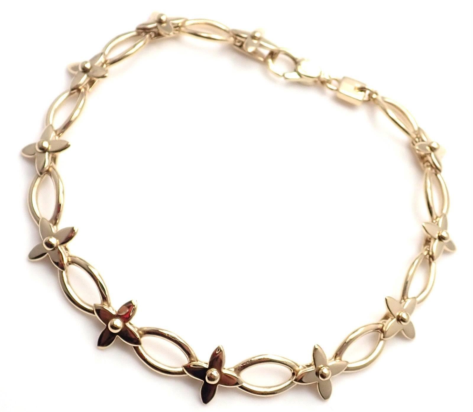 18k Yellow Gold Idylle Blossom Link Bracelet by Louis Vuitton. 
This bracelet is limited edition from year 2006.
Details: 
Length: 7