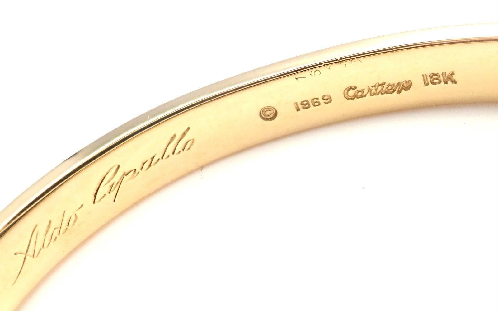 18k Yellow Gold Original Vintage Love Bangle Bracelet by Aldo Cipullo for Cartier.
This bracelet comes with a Cartier box and Cartier screwdriver.
Details: 
Size: 16
Weight: 12 grams
Width: 6.5mm 
Hallmarks: Cartier 18k 1969 16443
*Free Shipping