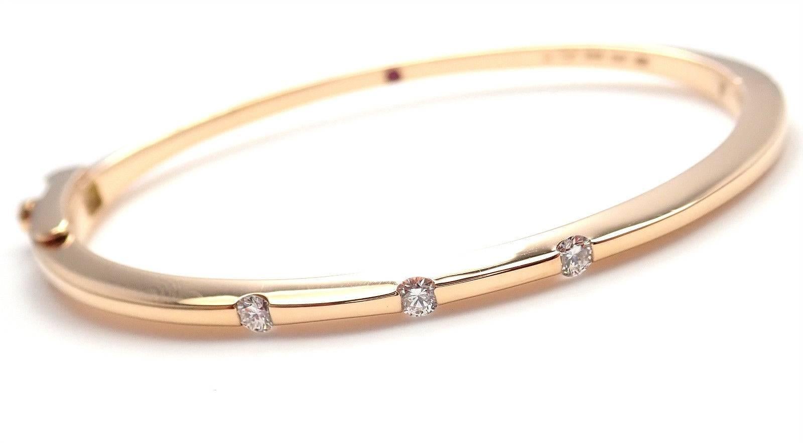 18k Yellow Gold Diamond Classica Parisienne Bangle Bracelet by Roberto Coin. 
With 3 High Quality VS1 diamonds G Color diamonds total weight .21ct
Details:
Weight: 17.7 grams
Length: 6.5''
Width: 5.5mm
Stamped Hallmarks: 18k Roberto Coin Italy
*Free