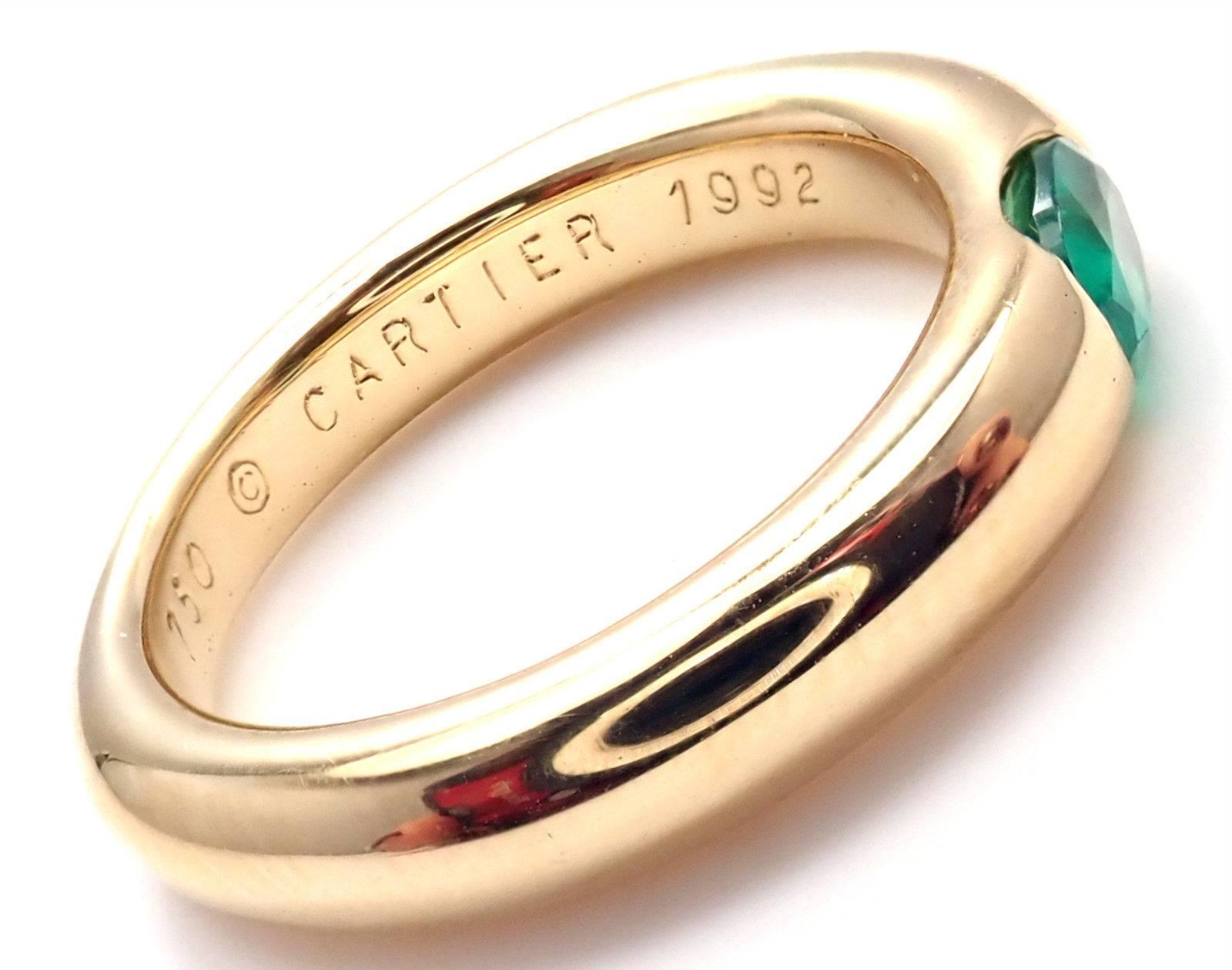 18k Yellow Gold Ellipse Emerald Band Ring by Cartier.
With 1 oval-shaped beautiful emerald 5mm x 4mm.
This ring comes with Cartier box.
Details:
Width: 4mm
Weight: 8.5 grams
Ring Size: European 53, US 6 1/4
Stamped Hallmarks: Cartier 750 53 C90640