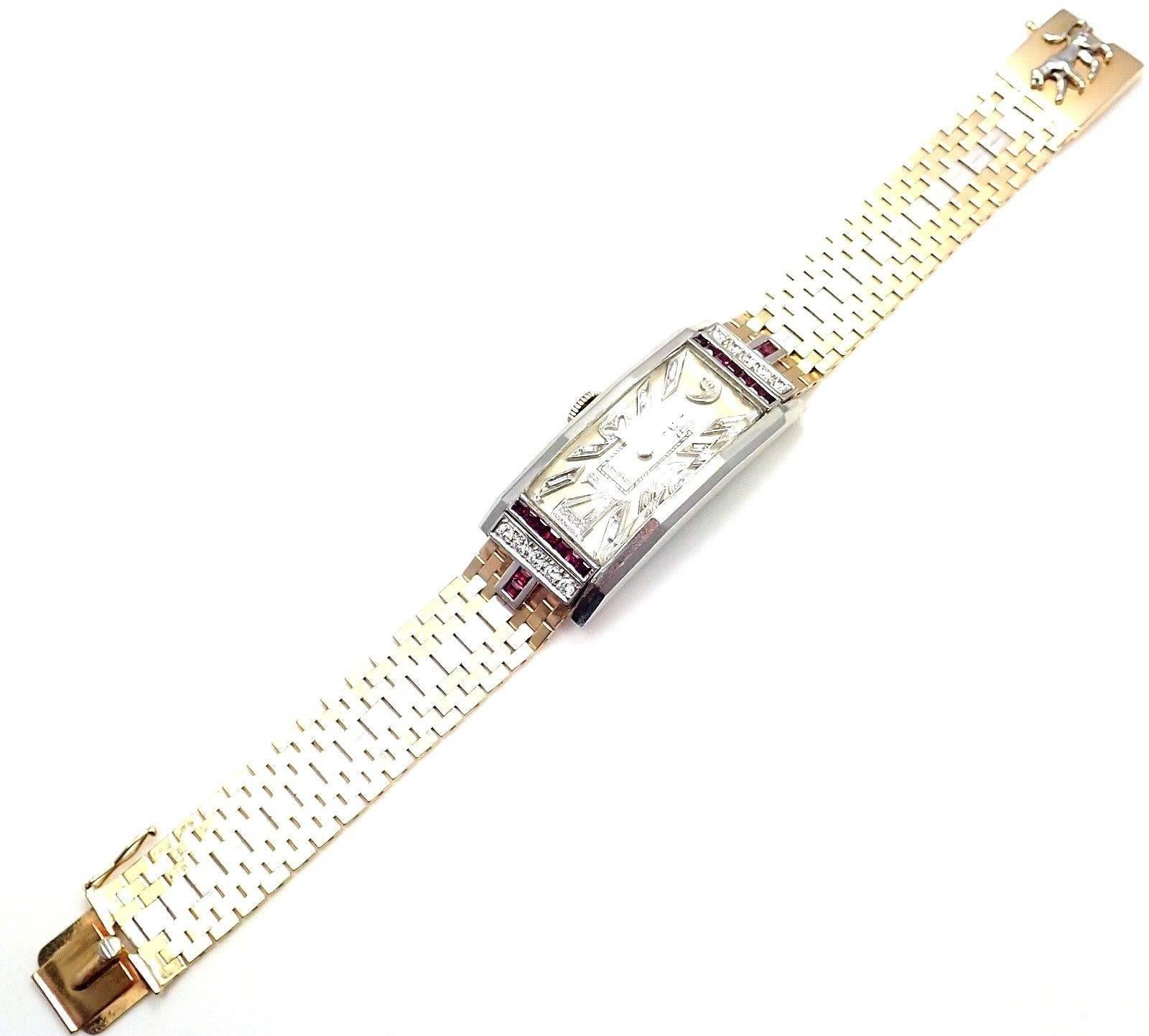 Platinum And 14k yellow and white gold Diamond Ruby Longines watch from Estate of Jackie Collins. 
*** LONGINES. A FINE PLATINUM AND DIAMOND WRISTWATCH AND A BI-COLORED GOLD BRACELET
Movement No. 6197278, circa 1945 17-jewel manual movement, Cal.