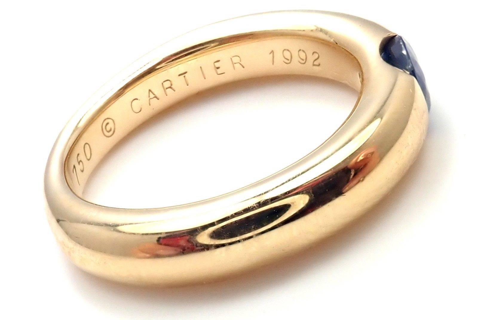 18k Yellow Gold Ellipse Sapphire Band Ring by Cartier.
With 1 oval-shaped beautiful sapphire 5mm x 4mm.
Details:
Width: 4mm
Weight: 9 grams
Ring Size: 6, Europe 52
Stamped Hallmarks: Cartier 750 52 D10662 1992
*Free Shipping within the United