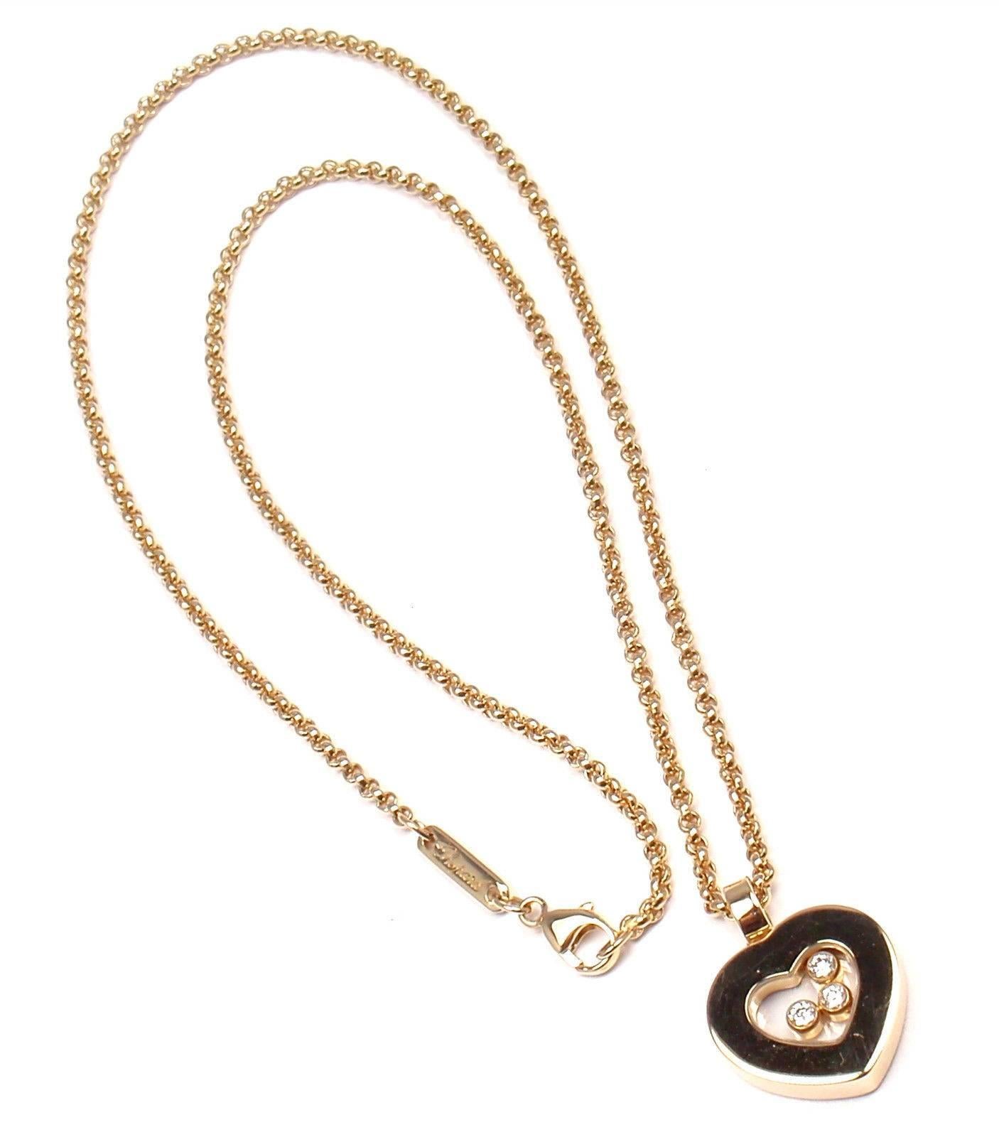 18k Yellow Gold Happy Diamond Heart Pendant Necklace  by Chopard.  With 3 Round Brilliant Cut Diamonds VS1 total weight approx. .17ct
Details: 
Chain Length: Length: 17