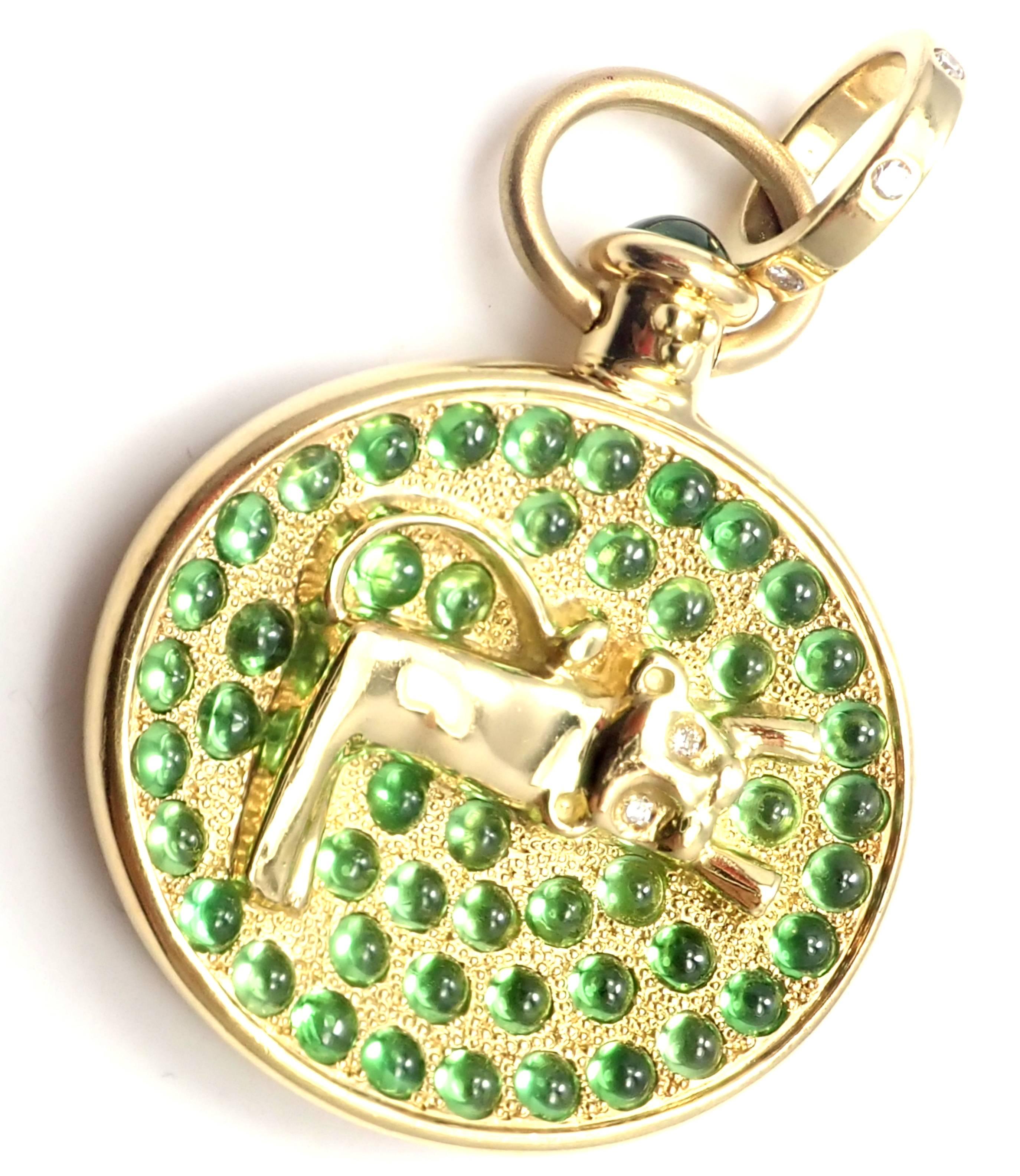 18k Yellow Gold Diamond Tsavorite Garnet Terrae Lion Pendant by Temple St Clair. 
This piece comes with a pouch. 
With Round Diamonds total weight (0.13ct) and Tsavorite: 4.3 ct
Details: 
Measurements: 31mm in diameter and 47mm in length with bail,