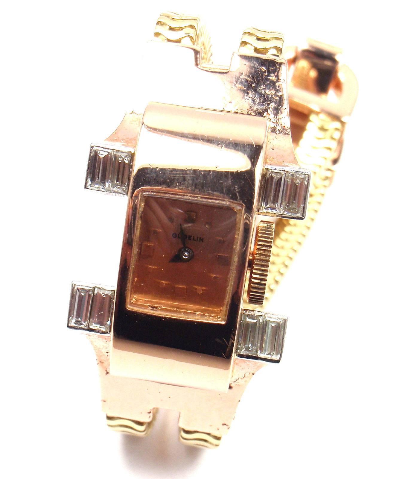 Vintage Gubelin Ladies 18k rose and yellow gold diamond wristwatch.
With 8 emerald cut diamonds VS1 clarity E color total weight approx. .96ct
Details: 
Case Dimensions: 28mm x 12mm
Length: 7