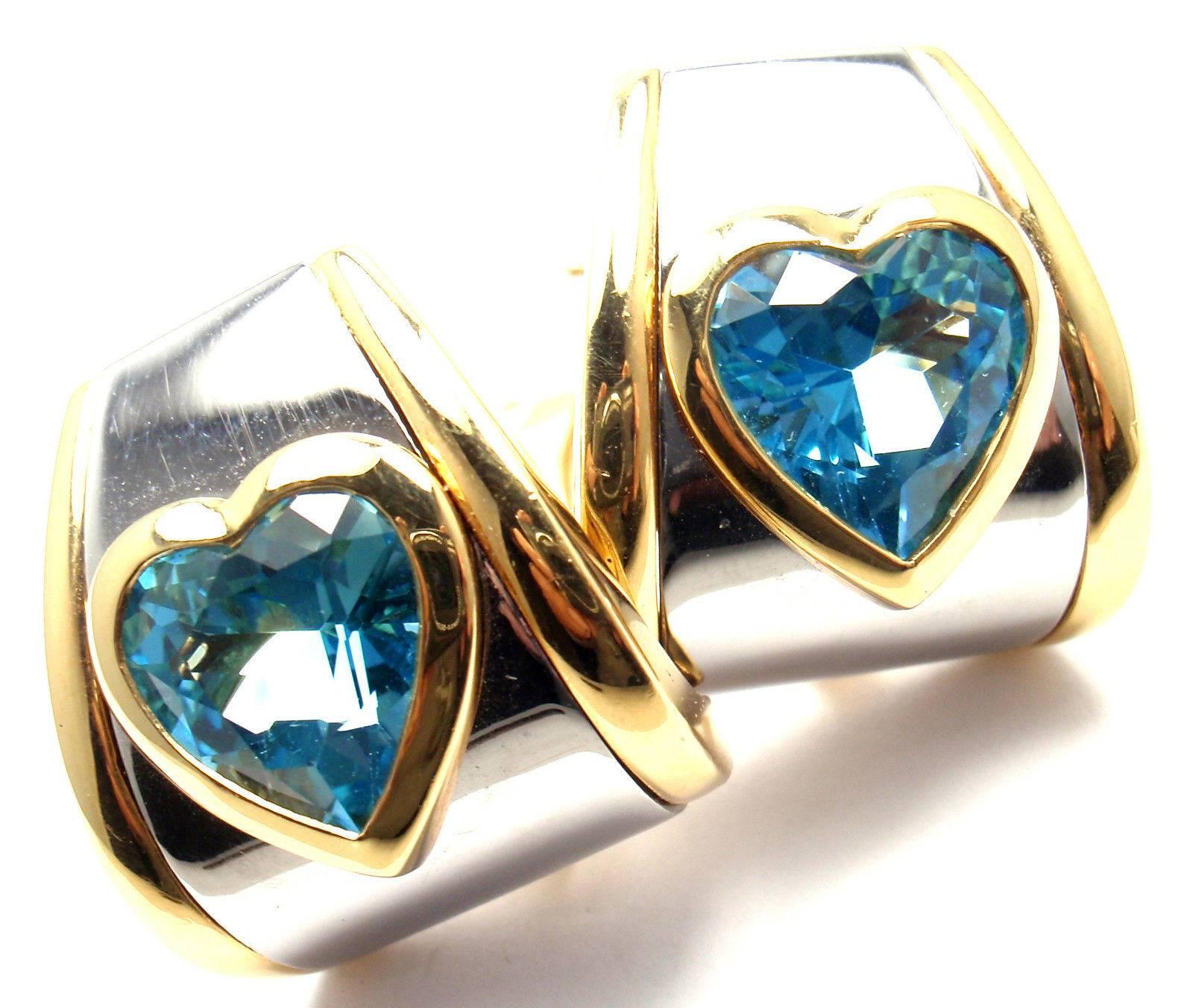 18k Yellow Gold And Stainless Steel Heart Shape Blue Topaz Earrings by Marina B. 
With 2 heart shape blue topaz stones 13mm x 12mm each.
These earrings are for non pierced ears, but can be converted for pierced ears.
Details:
Measurements: 20mm x