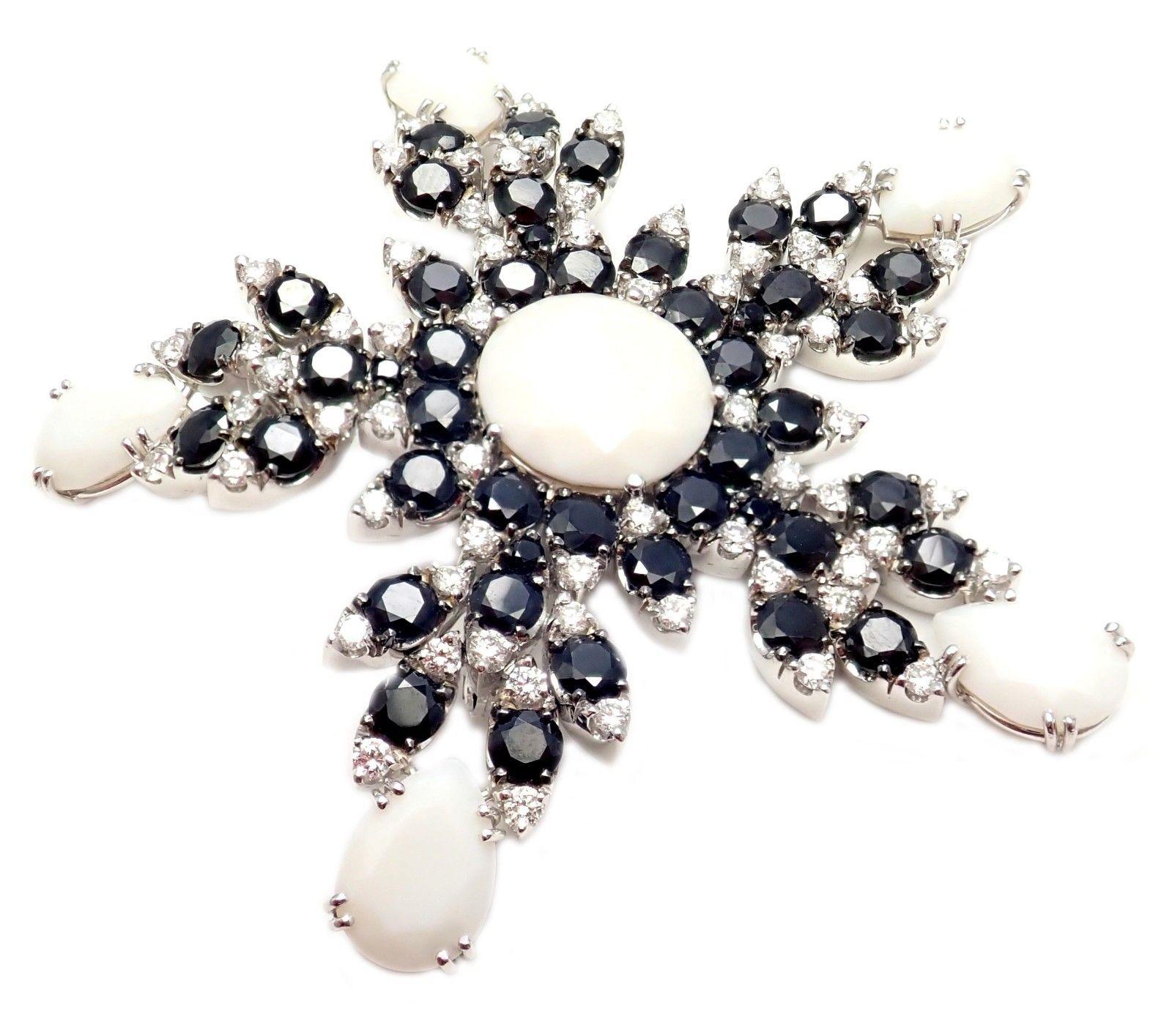 18k White Gold Diamond White Kogolong Sapphires Ghirlanda 70 Queen Pin Brooch by Pasquale Bruni.  
With White Kogolong: 29.54ctw
Diamonds: 2.26ctw
46x Blue Sapphires
This brooch come with Box, Certificate and Tag.  
Details:  
Measurements: 65mm x