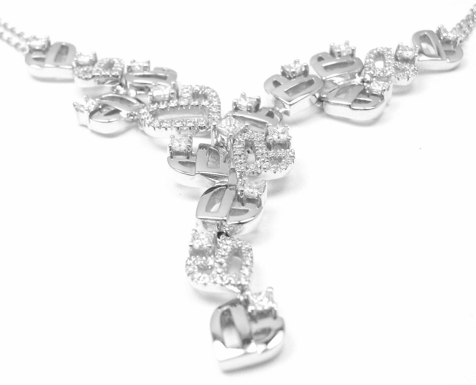 18k White Gold Diamond Pendant Necklace by Damiani.
With Round brilliant cut diamonds VS1 clarity, G color total weight 
approximately 1.72 ct.
This necklace comes with Box, Certificate.
Details:
Measurements: Pendant: 50mm x 5mm
Length: 14