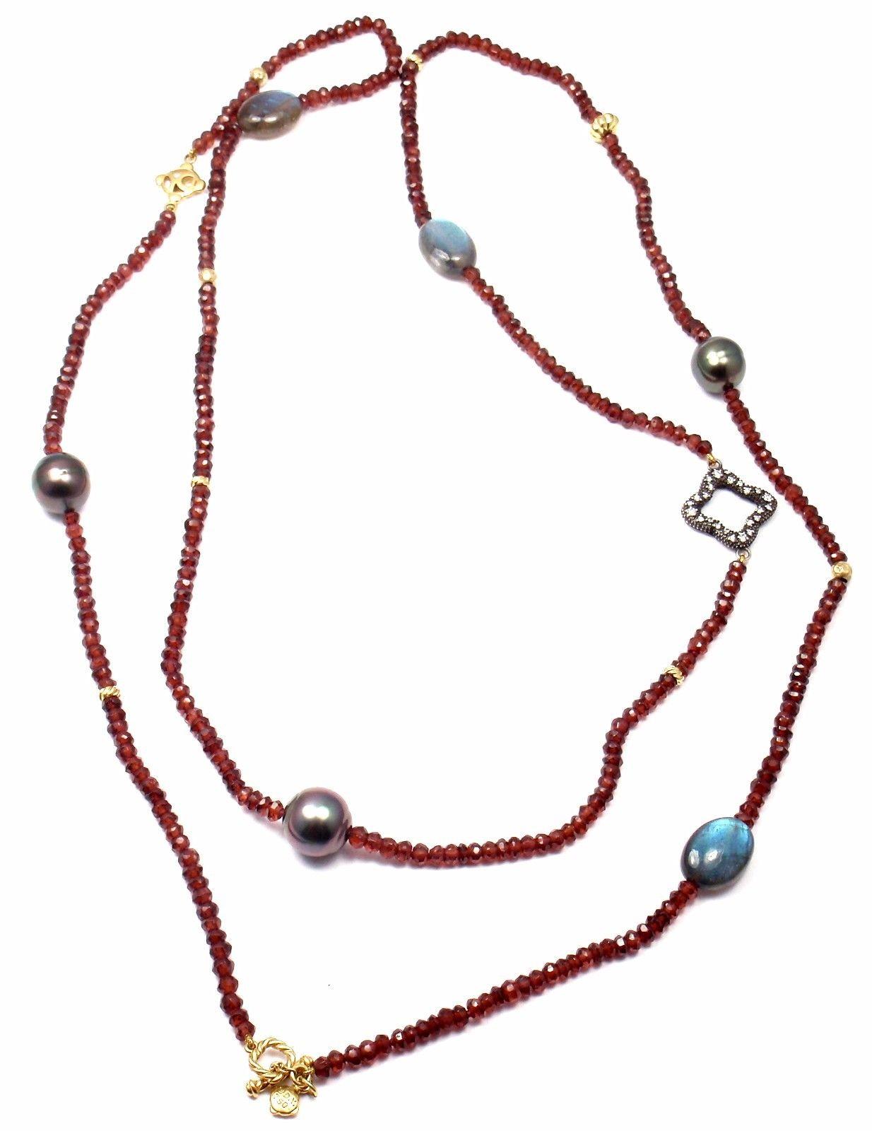 18k Gold And Silver Diamond Garnet Rondelle Pearl Necklace by David Yurman.
With Garnet rondelle, cabochon labradorite, and 18-karat yellow gold beads, 3.5-10mm Gray cultured Tahitian pearls, naturally hued, 10-11mm diameter Pavé diamonds, 0.17