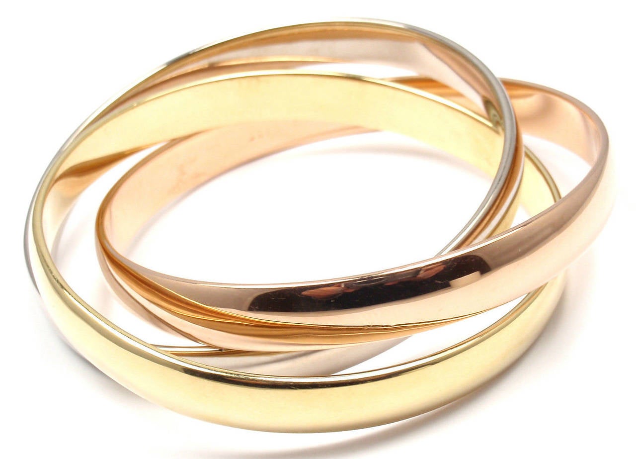 Cartier Trinity Rolling Large Model Tri-Colored Gold Bangle Bracelet In New Condition In Holland, PA