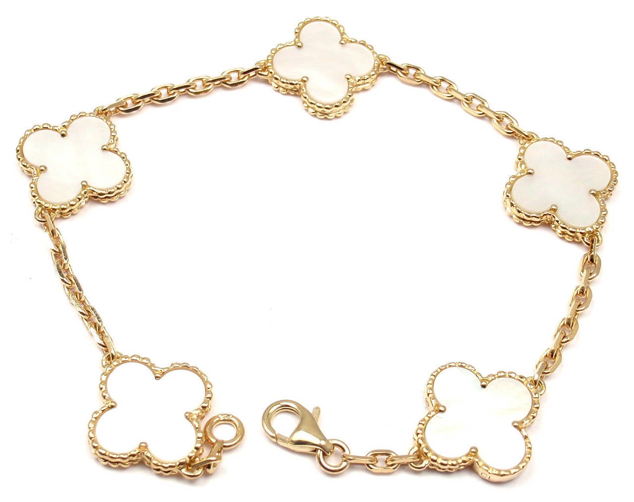18k Yellow Gold 5-Motif Mother of Pearl Bracelet by Van Cleef & Arples. Part of VCA's absolutely stunning 
