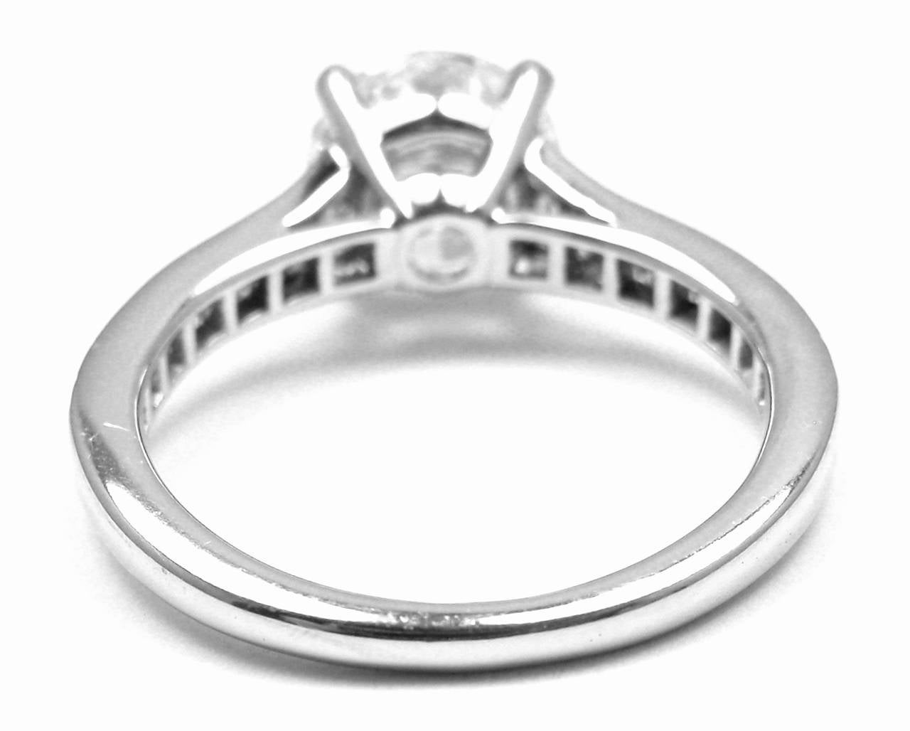 Platinum Diamond Solitaire Engagement Ring by Tiffany & Co. 
With 1.60ct Center Diamond VVS2 clarity, D color
.46ct square diamonds & .16ct baguette diamonds in the setting of the ring.
Includes Tiffany & Co Valuation, Tiffany& Co Diamond