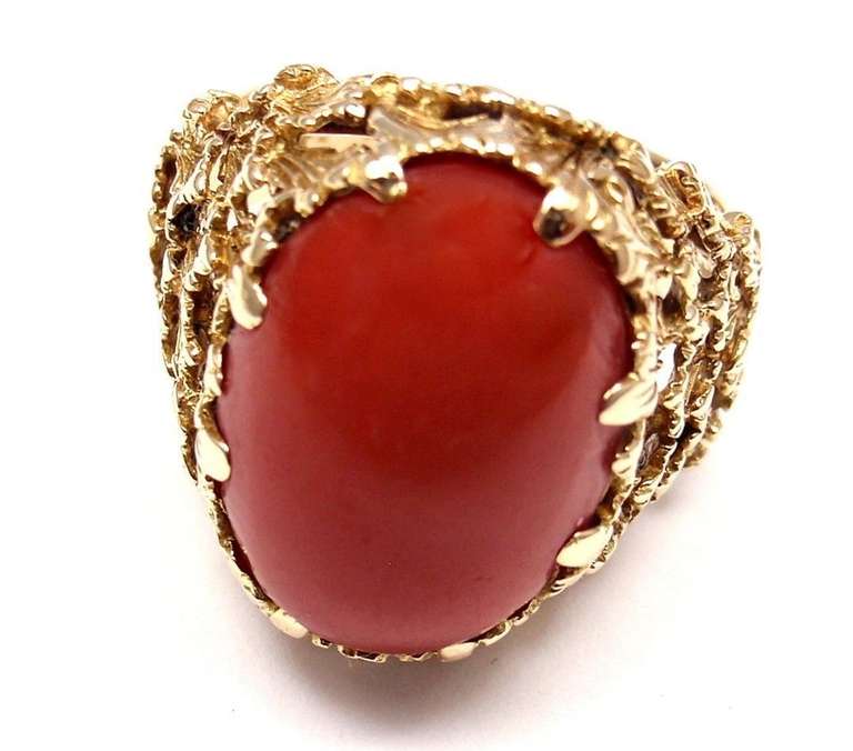 18k Yellow Gold Large Coral RIng by Tiffany & Co. With 1 large oval coral: 18mm x 14mm. 

Details: 
Width: 19mm
Weight: 8.8 grams
Ring Size: 6 3/4
Stamped Hallmarks: TIFFANY & CO 18k
*Free Shipping within the United States*

YOUR PRICE: