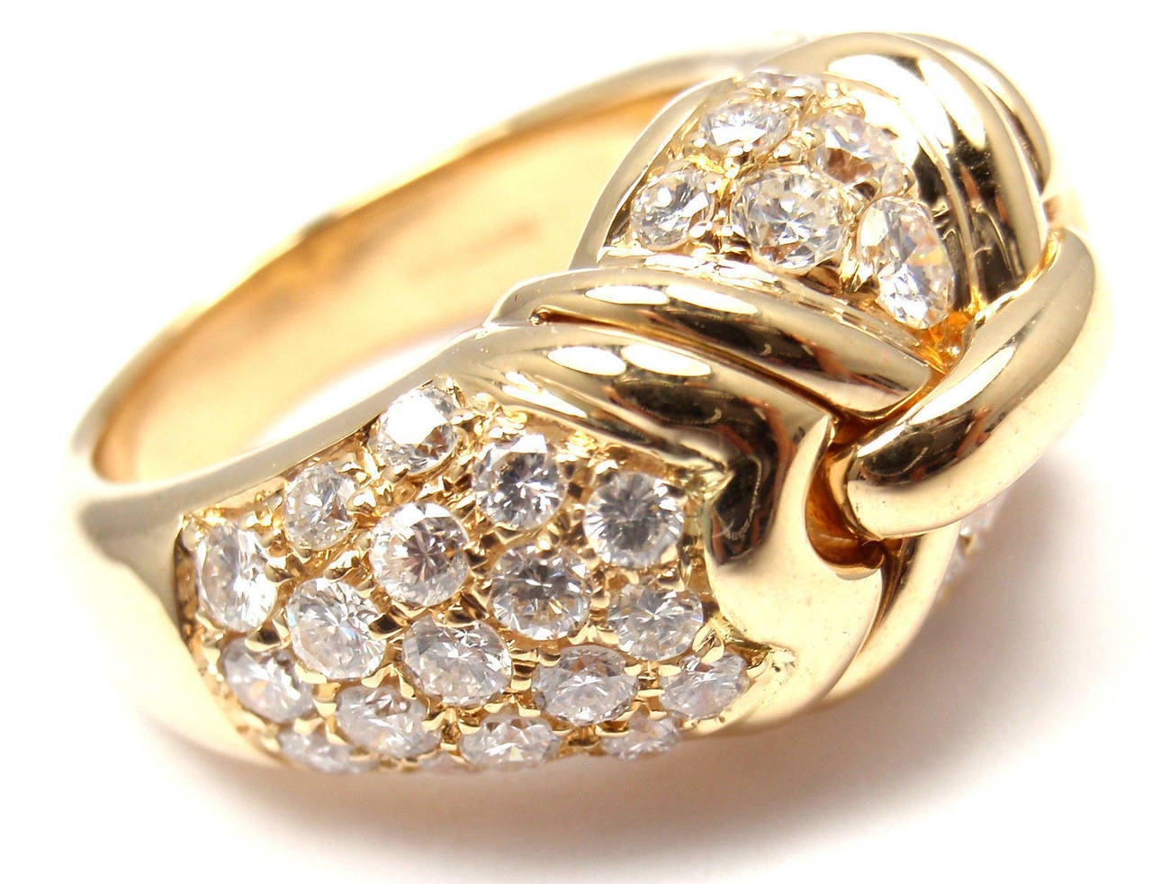 18k Yellow Gold Diamond Ring by Bulgari. 
With 50 Diamonds approximately weighing 2cts With G Color And VS1 Clarity

Details: 
Ring Size: 6
Weight: 15.6 grams
Width: 13mm
Stamped Hallmarks: Bulgari, 750, 2337AL
*Free Shipping within the