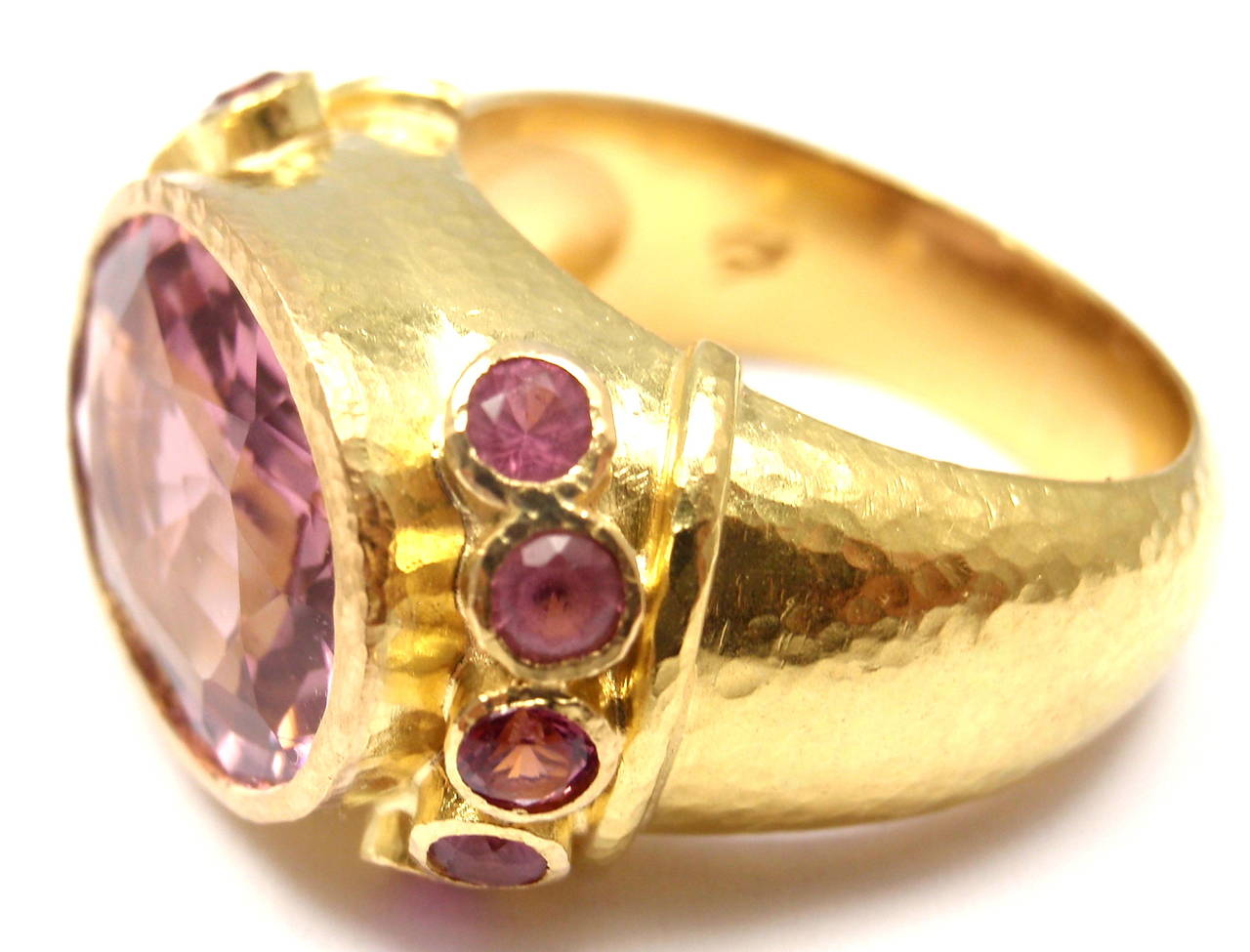 19k Yellow Gold Kunzite & Pink Sapphire Ring by Elizabeth Locke.
With 1 Kunzite 12mm x 14mm
10 round pink sapphires 3mm each

Details: 
Ring Size: 6.5
Weight: 15.3 grams
Width: 13mm
Stamped Hallmarks: Elizabeth Lock Hallmark 19k
*Free