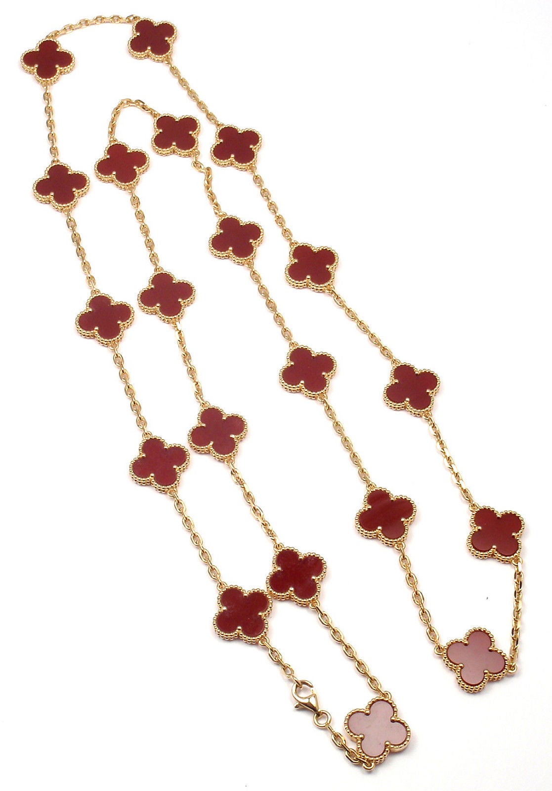 18k Yellow Gold Alhambra 20 Motifs Carnelian Necklace by Van Cleef & Arpels. With 20 motifs of carnelian Alhambra stones 15mm each.  This necklace comes with VCA box & VCA certificate.

Details: 
Length: 31.5