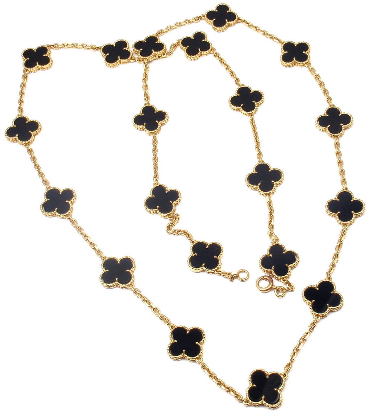 18k Yellow Gold Alhambra 20 Motifs Black Onyx Necklace by 
Van Cleef & Arpels, with 20 motifs of black onyx Alhambra stones, 15mm each.

This is a rare, very collectible, antique Van Cleef & Arpels black onyx Alhambra 
necklace from the 1970's.