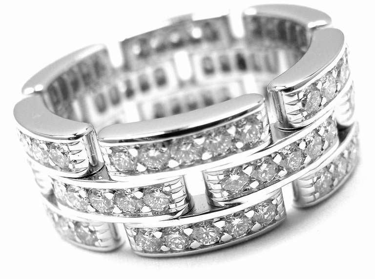18k White Gold Maillon Panthere Diamond Eternity Band Ring by Cartier. 
With 90 round brilliant cut diamonds total weight approx 2.25ct. 
Diamonds VVS1 clarity, F color.

Details:
Size:    7 3/4, 54
Width:  8mm
Weight: 10.3 grams
Stamped