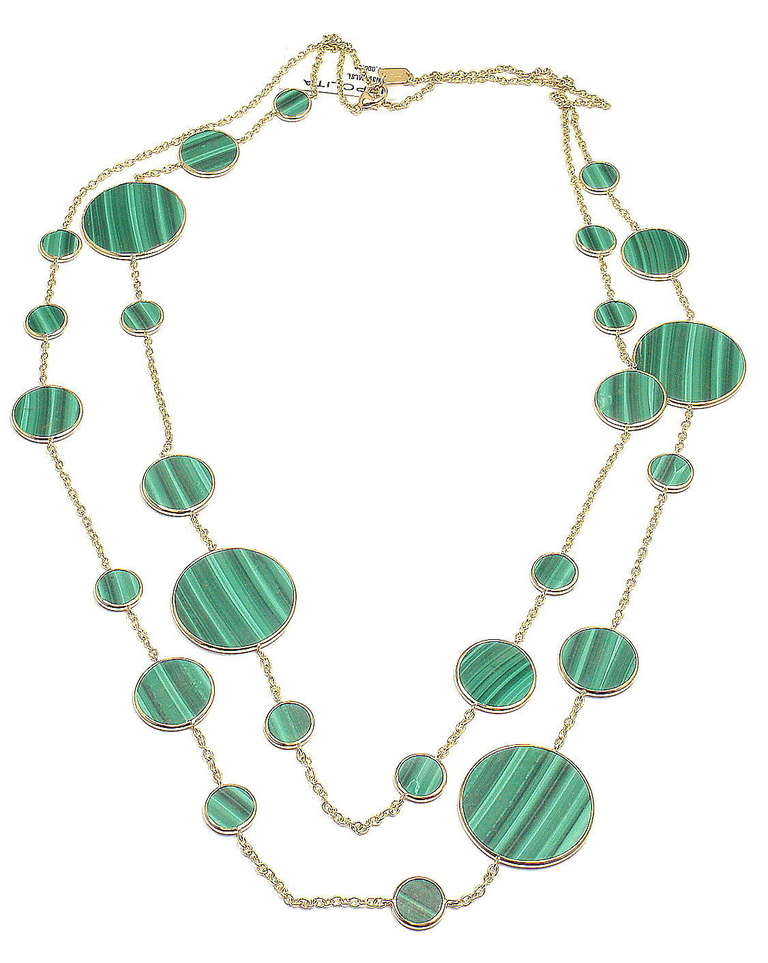18k Yellow Gold Polished Rock Candy Malachite Circle Station Necklace by Ippolita. 
With 26 malachite stations, variant in size from 10, 17 to 27mm

Details: 
Length: 52 inches Long, Can be wrapped once.
Width: 27 mm at widest point
Weight: