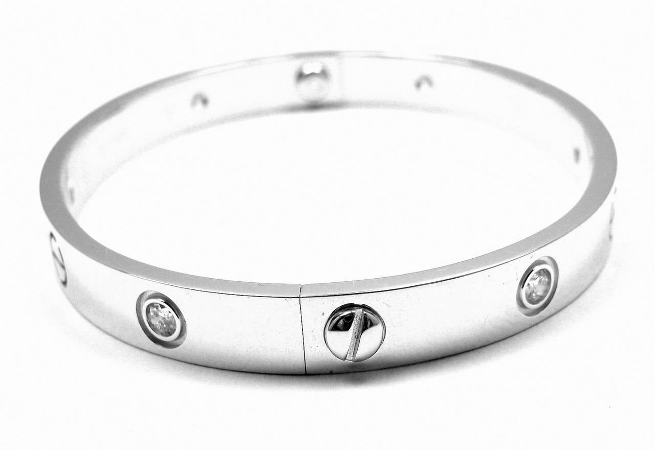 18k White Gold Cartier LOVE Bangle Bracelet, size 17.
With 6 brilliant round cut diamonds, VS1 clarity, E-F color total weight approx. .30ct
This bracelet comes with original Cartier box, certificate a screwdriver.

Details:
Weight: 33.7