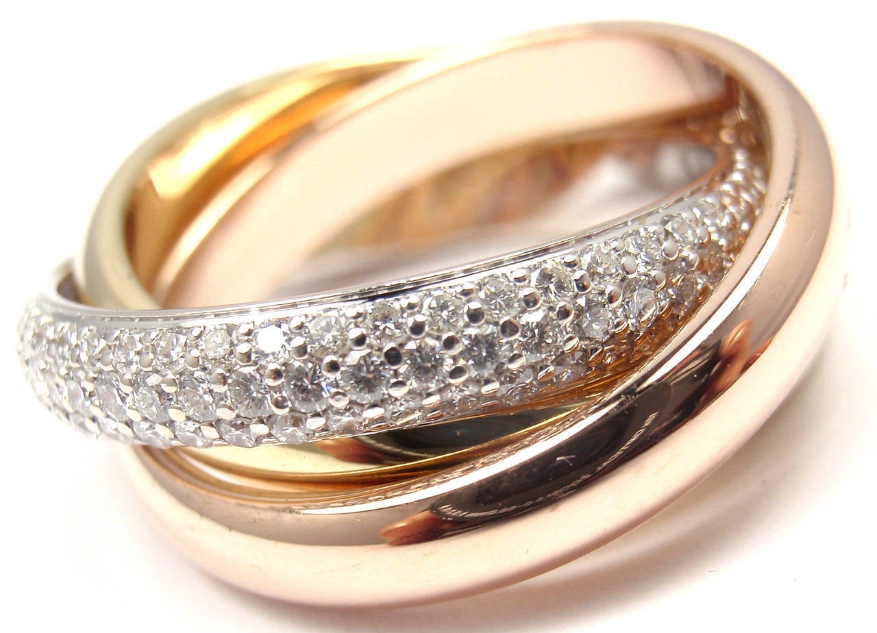 18k Tri-Color Gold Pave Diamond Trinity Band Ring by Cartier.
With Round brilliant cut diamonds VS1 clarity, G color total weight approximately 1.25ct

Details:
Size: European 53, US 6 1/4
Weight: 14.6 grams
Width: Each band is 4mm; Ring is