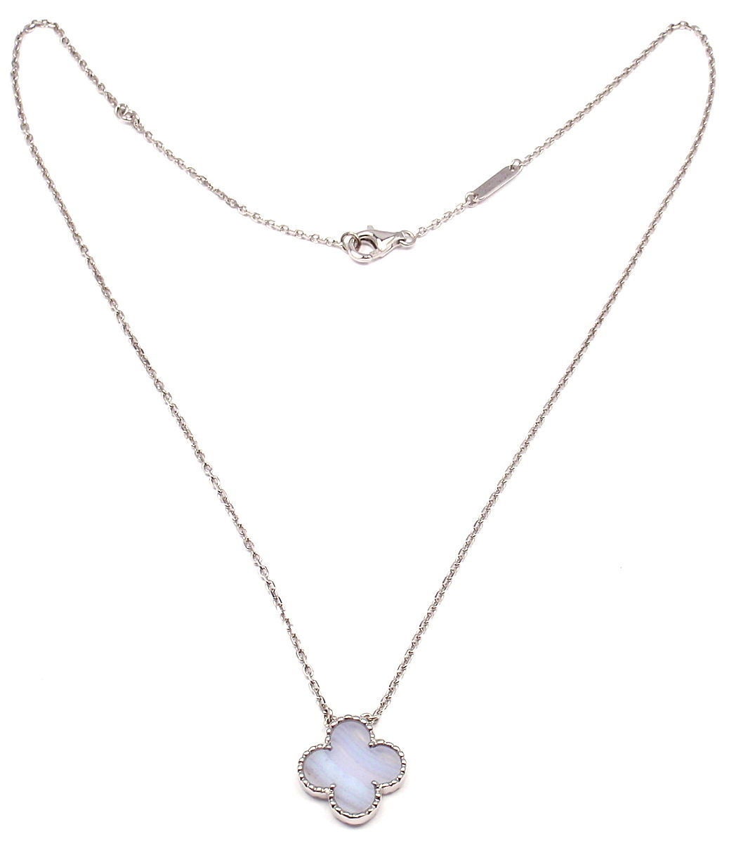18k White Gold Vintage Alhambra Chalcedony Pendant Necklace by Van Cleef & Arpels. 
With 1 chalcedony stone: 15mm. 

Details: 
Length: 17