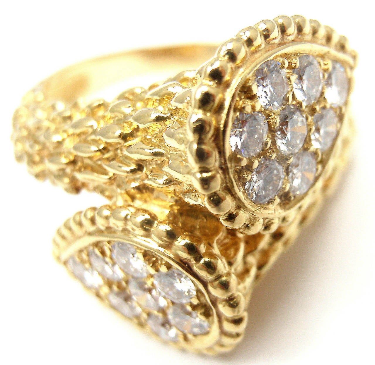 bague à diamants Serpent Bohème Toi et Moi en or jaune 18k de Boucheron. Avec 16 diamants ronds de taille brillante:: pureté VS1:: couleur E:: 
poids total environ 0::66 ct

Détails : 
Taille de l'anneau : 6
Poids : 11.3 grammes
Largeur :