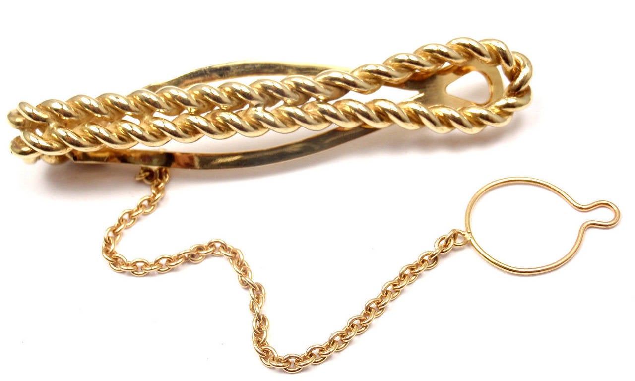 18k Yellow Gold Tie Clip Bar by Aston Martin. 

Details: 
Measurements: 2.5