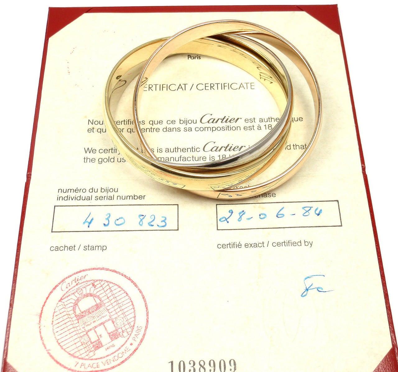 Cartier Trinity Rolling Large Model Tri-Colored Gold Bangle Bracelet In New Condition In Holland, PA