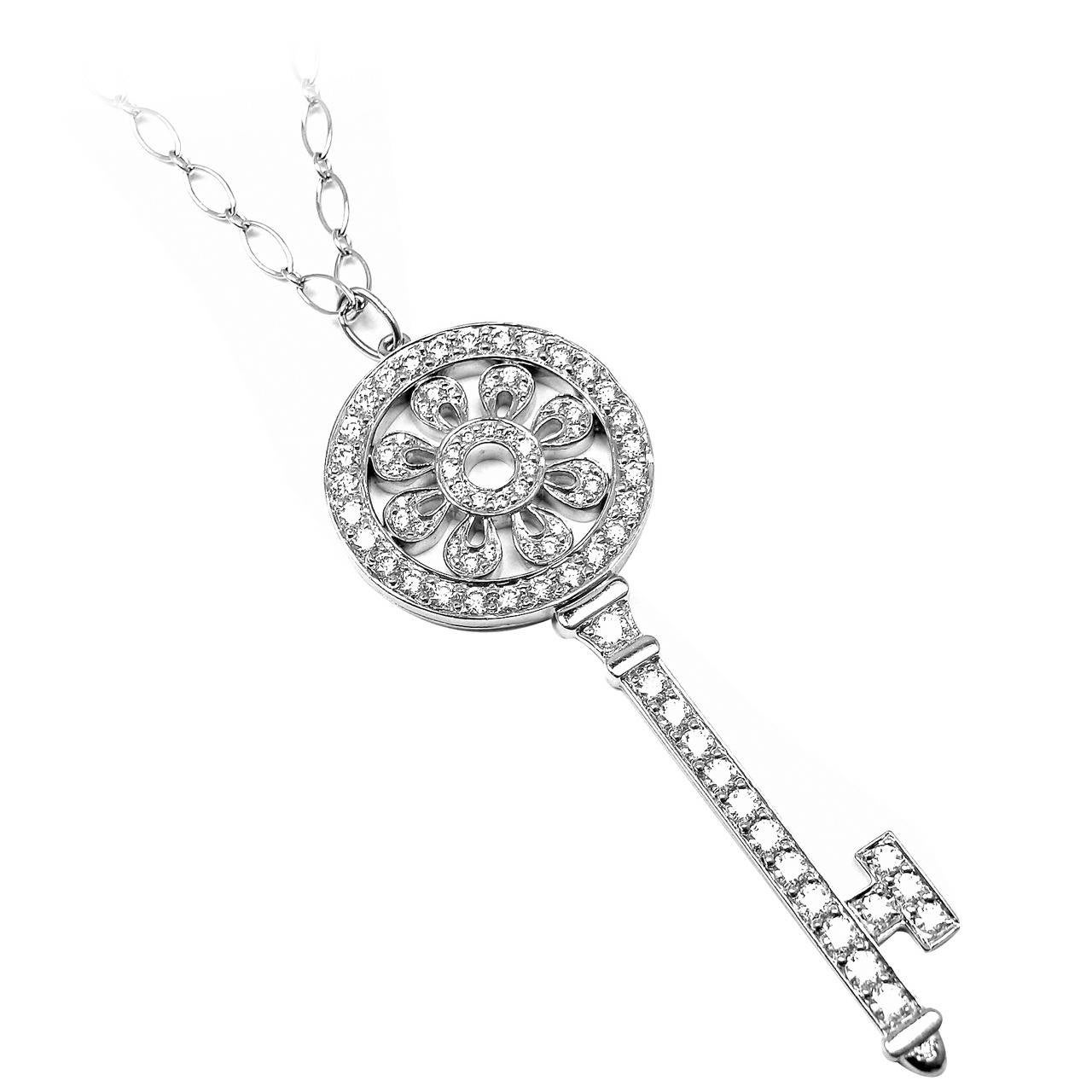 Tiffany and Co. Diamond Gold Platinum Petals Key Pendant Necklace at