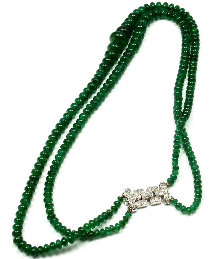 18K White Gold Diamond and 2 Strand Emerald Beads Necklace by 
Seaman Schepps. 

With 2 strands of 218 emerald beads from 13mm to 3mm total weight 
approximately 200ct
70 round brilliant cut diamonds VS1 clarity, G color total weight approx.
