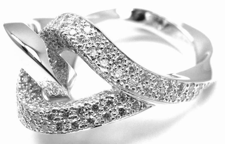 18k White Gold Twisted Free Form Diamond Ring by HERMES. 
With 95 round brilliant cut diamonds approx. 2ct
VVS1 clarity, E color

Details: 
Ring Size: European 52 US 6
Ring Top Width: 15mm
Weight: 20 grams
Stamped Hallmarks: HERMES 750 52