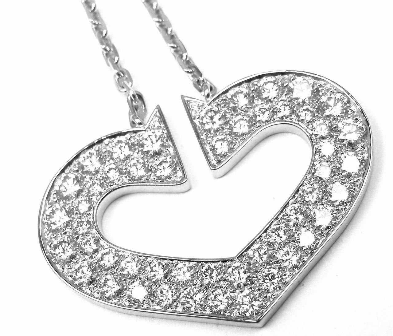 18k White Gold Large Diamond Heart Necklace by Cartier.
With 52 round brilliant cut diamonds VVS1 clarity, E color total weight approx. 2ct

This necklace comes with original Cartier box & Cartier paper.

Retail Price: $18,500 plus